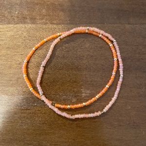 Orange, Pink, and Gold Beaded Bracelets
